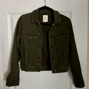 A green denim jacket, size XS